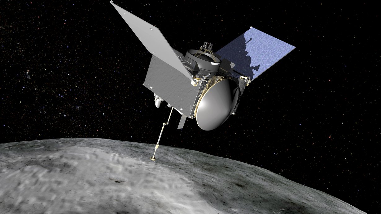 Taiteilijan näkemys luotain Osiris-Rexistä asteroidi Bennun yllä. Kuva: Nasa