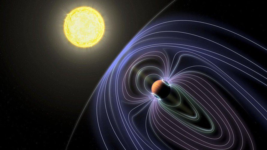 Taiteijan näkemys Tau Boötes B -järjestelmästä. Siniset viivat kuvaavat planettaa suojaavaa magneettikenttää. Kuva: <span class="photographer">Jack Madden/Cornell University</span>