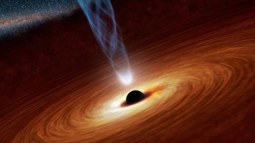 Taiteilijan näkemys supermassiivisesta mustasta aukosta. Se ahmii ainetta ja säteilee hurjasti. Kuva: <span class="photographer">Nasa</span>